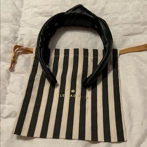 Classic black leather Lele Sadoughi headband with dust bag